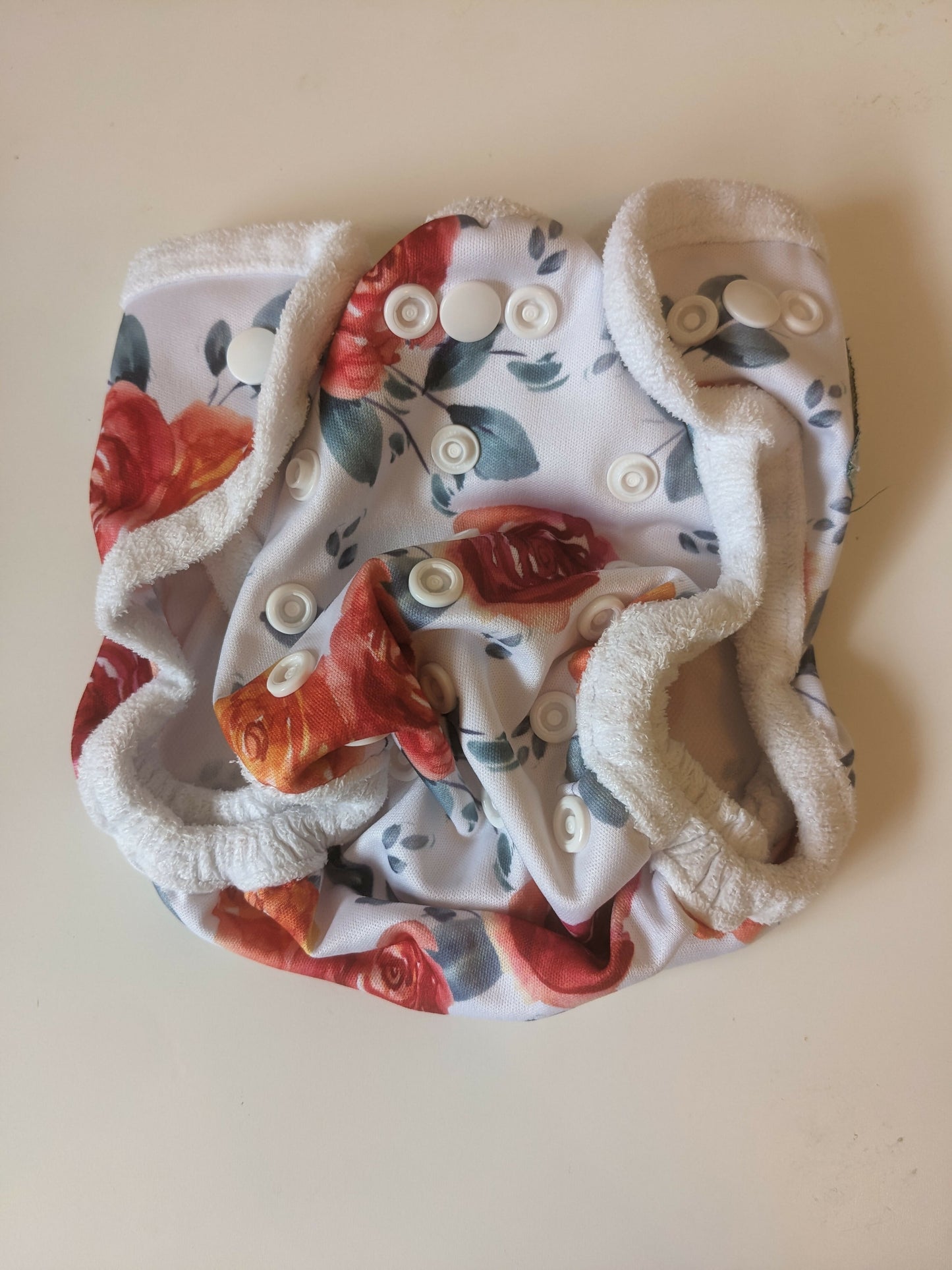 Bells bumz roses newborn wrap