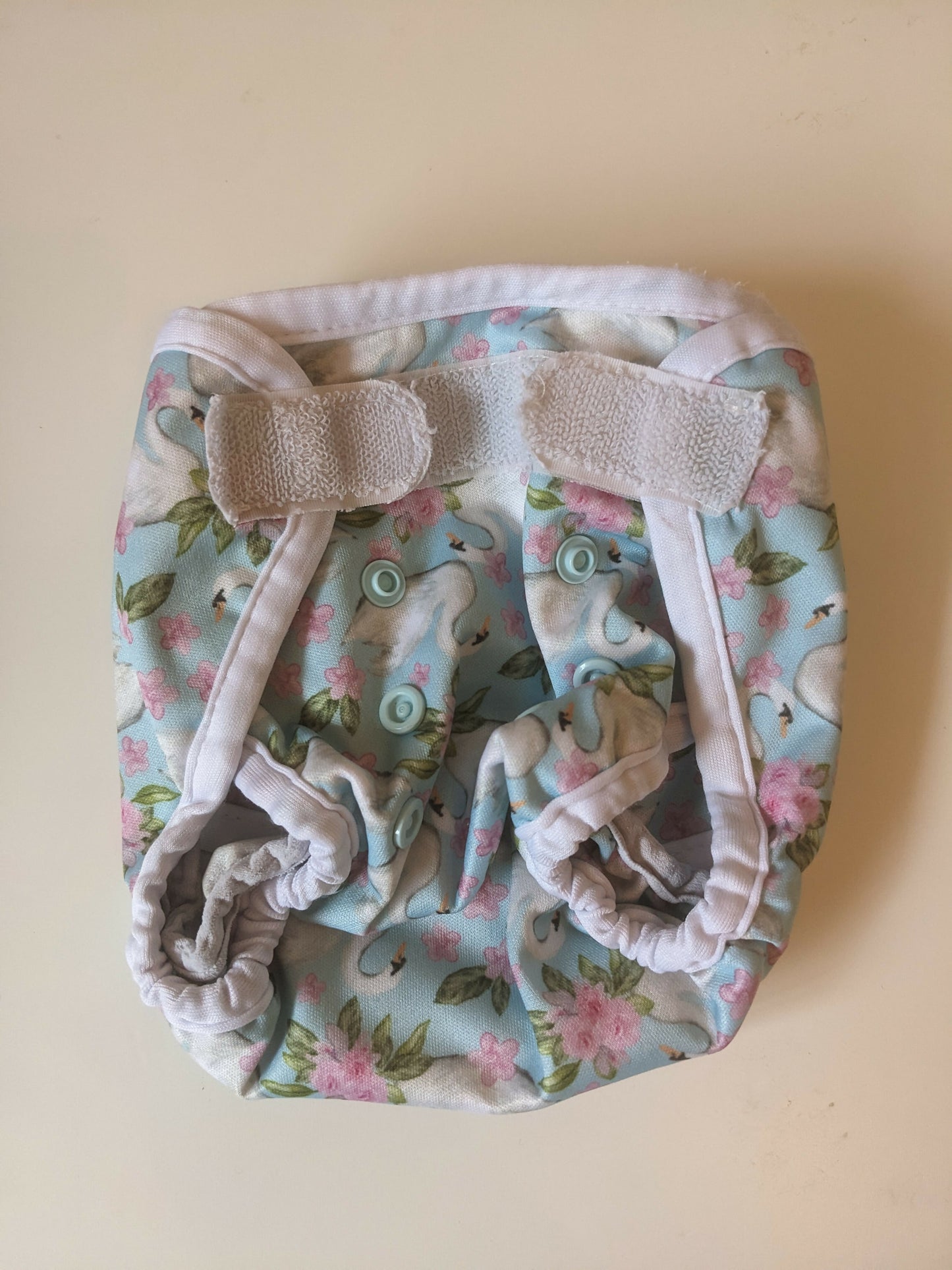 TJ's reusables swans newborn wrap