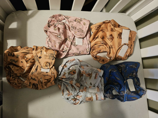 *Brand new* 5 size 1 little lamb nappy wraps