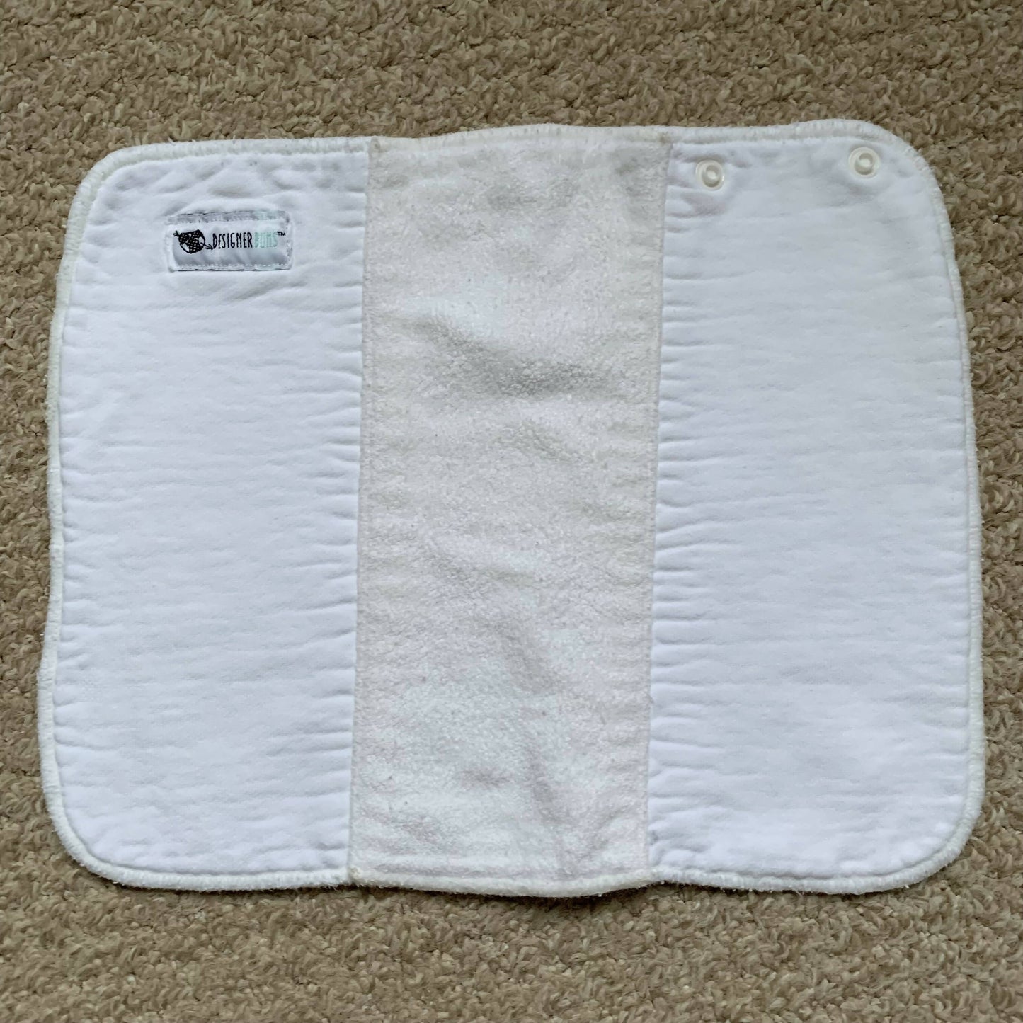 Designer Bums trifold